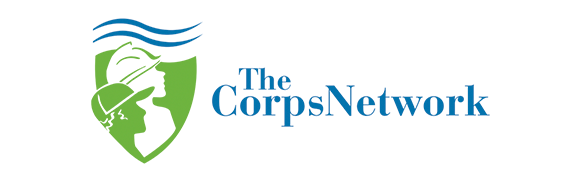 A logo for the corps network with a shield