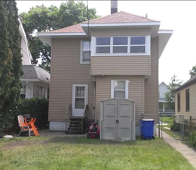 A house with the letter h on the front of it