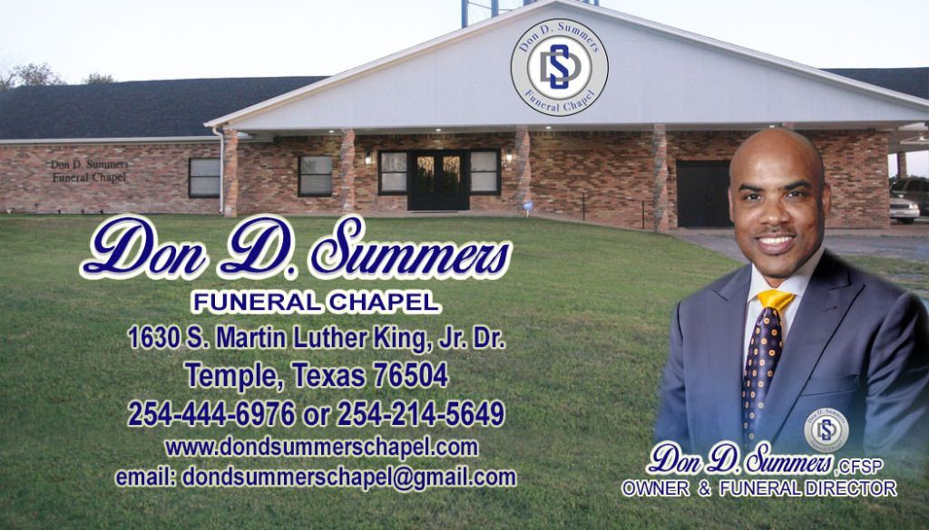 A man in a suit and tie is standing in front of a funeral chapel