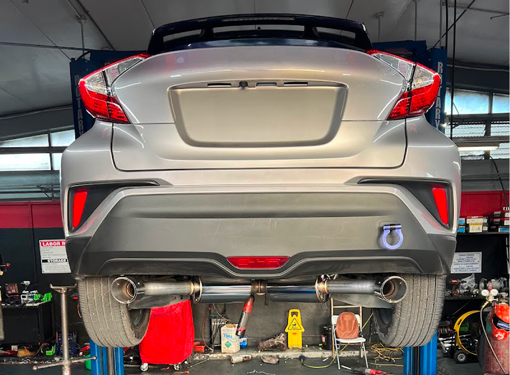 Silver Toyota C-HR on a lift | King Mufflers