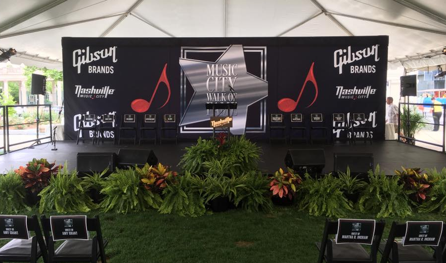 a stage with a sign that says gibson on it