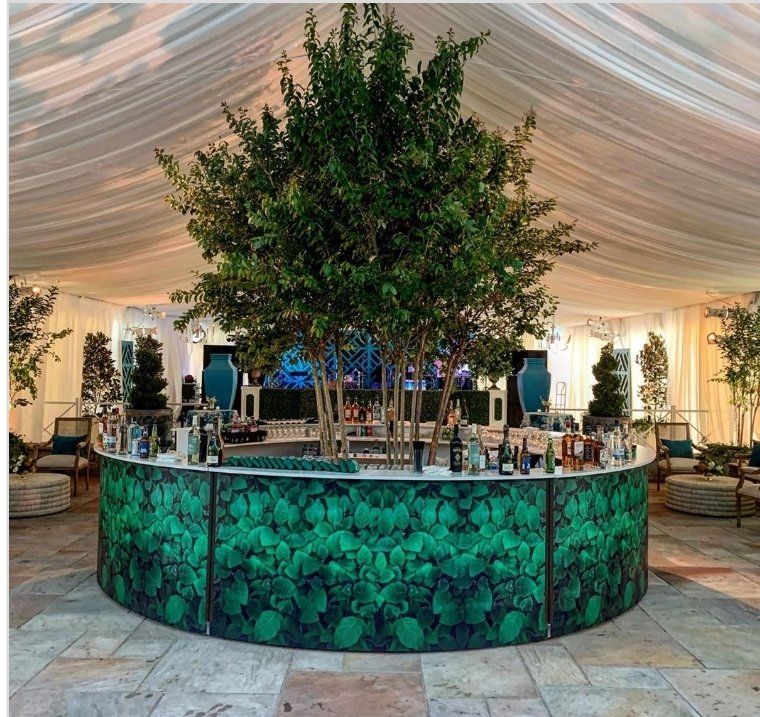 a circular bar with a tree in the middle of it