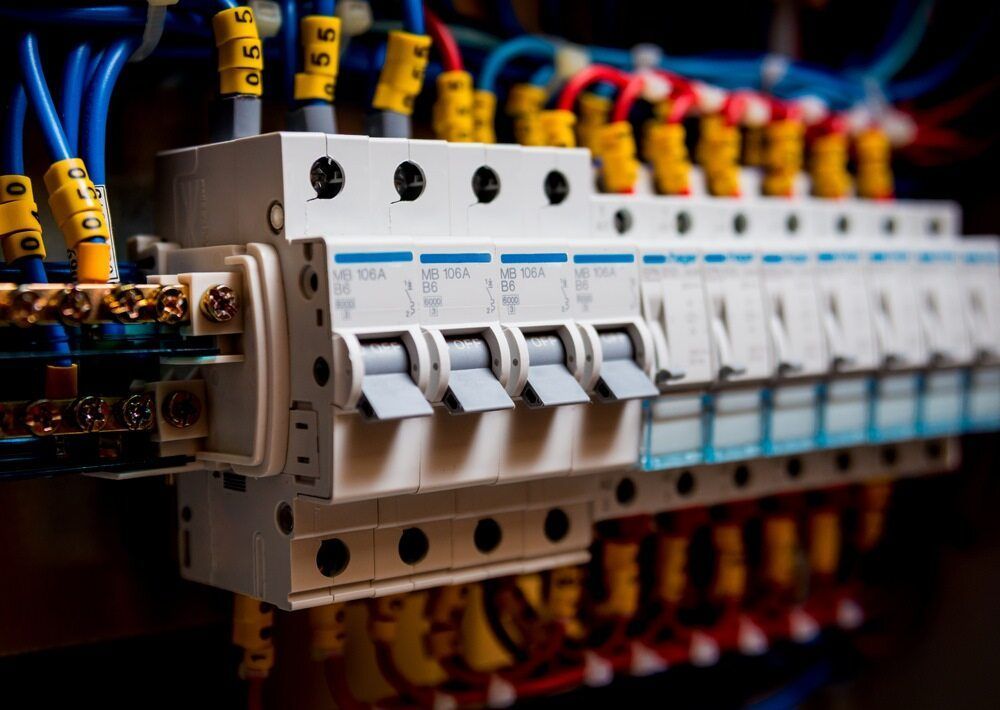 A Close-Up of A Residential Electrical Circuit Breaker Panel with Labelled Wires and Switches — AC/DC Electrical, Air Conditioning & Refrigeration In Esk, QLD