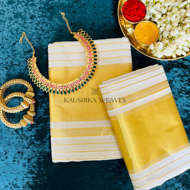 Indian silk sari, handmade white Kerala Sari and gold ornaments, jewellery.  woman use this traditional wear on Onam festival, Vishu, wedding in India.  multi-colored saree clothing. Stock Photo | Adobe Stock