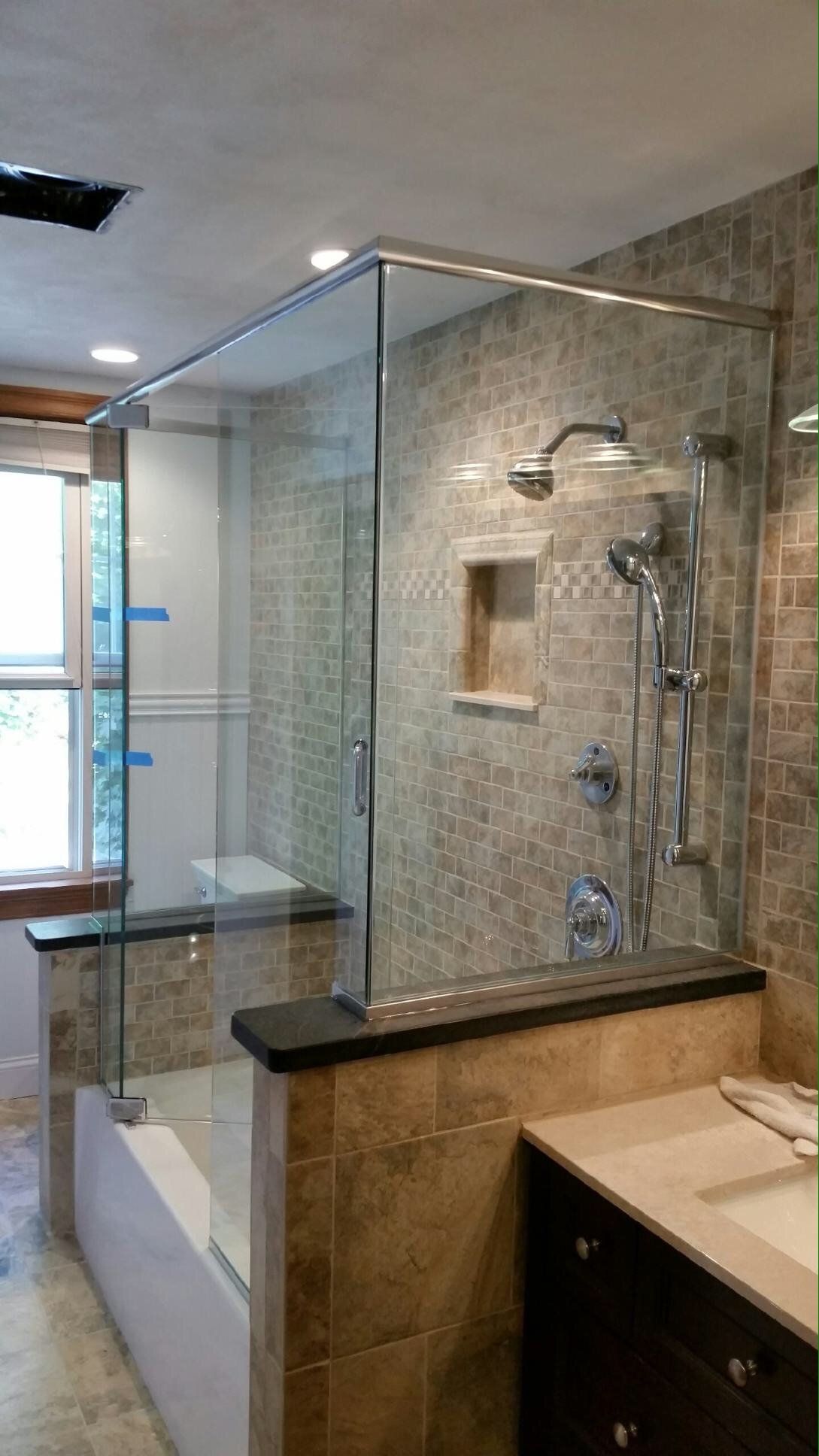 shower_door_brown_tile