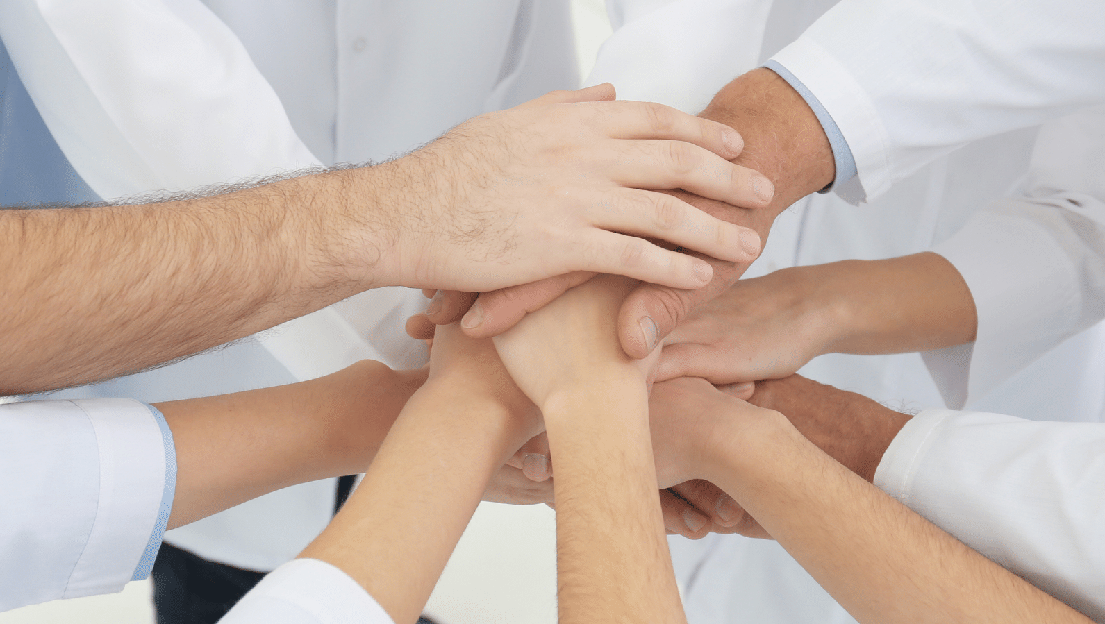 Doctors are placing hands together for health systems.
