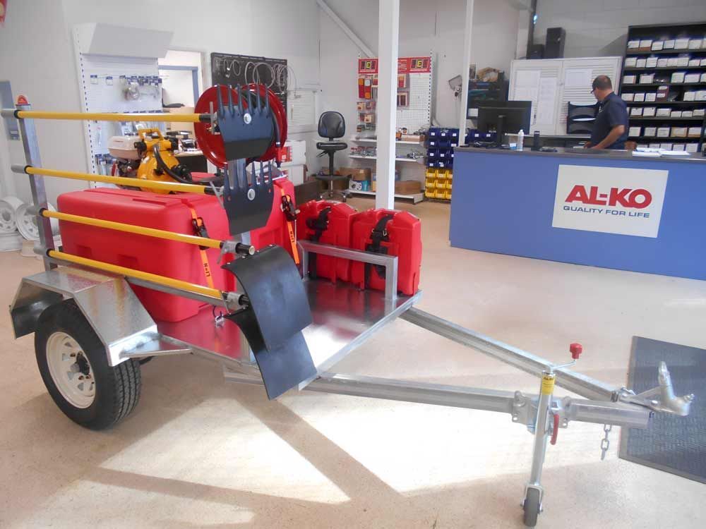 A Red Al-ko Trailer Is Parked In A Store — Hastings Trailer Centre in Port Macquarie, NSW