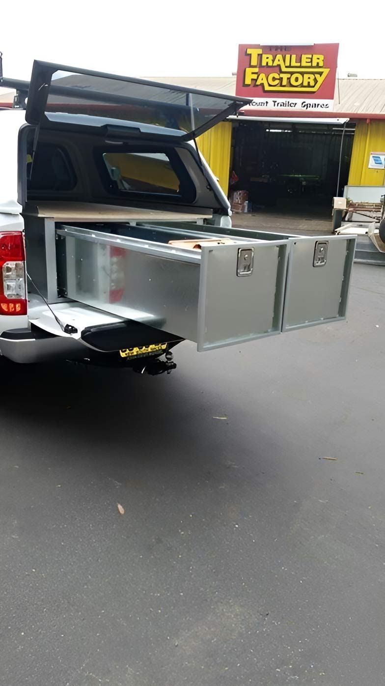 A truck is parked in front of a trailer factory — Hastings Trailer Centre in Port Macquarie, NSW