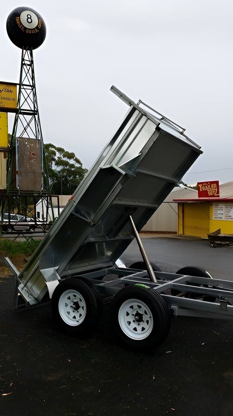 A Dump Trailer Is Parked In A Parking Lot — Hastings Trailer Centre in Port Macquarie, NSW