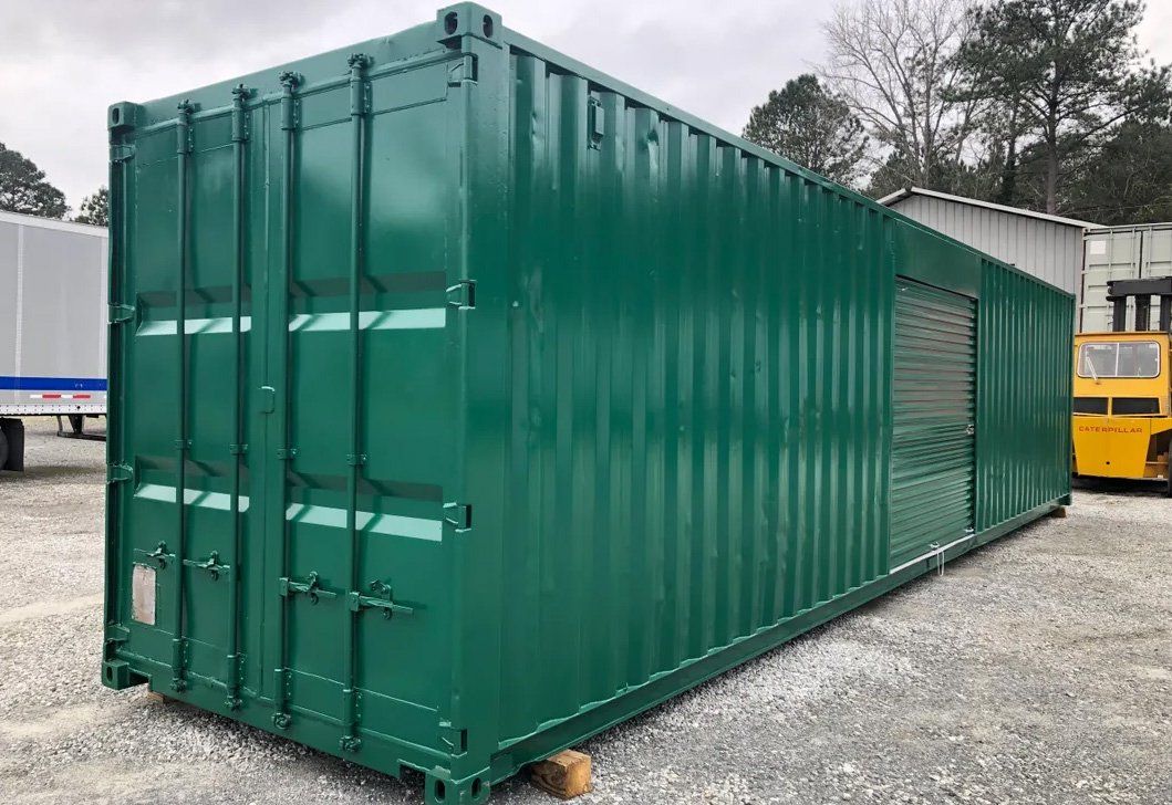 Shipping Container Refurbished green with a side door