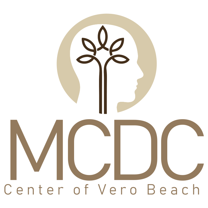 a logo for the mcdc center of vero beach