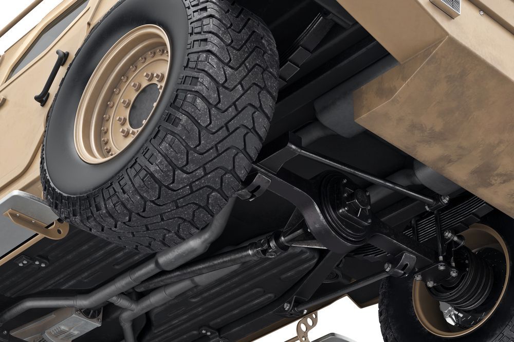 Undercarriage of Vehicle Showing a Spare Tire, Suspension — Jims Auto Care in Berrimah, NT