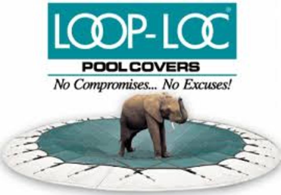 An elephant is standing on a pool cover that says loop-loc