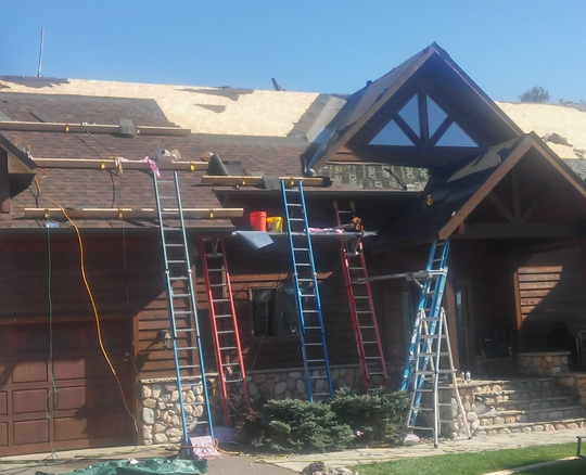 Two Roofers Inspecting Roof - New Richland, MN - Tom’s Miller’s Roofing