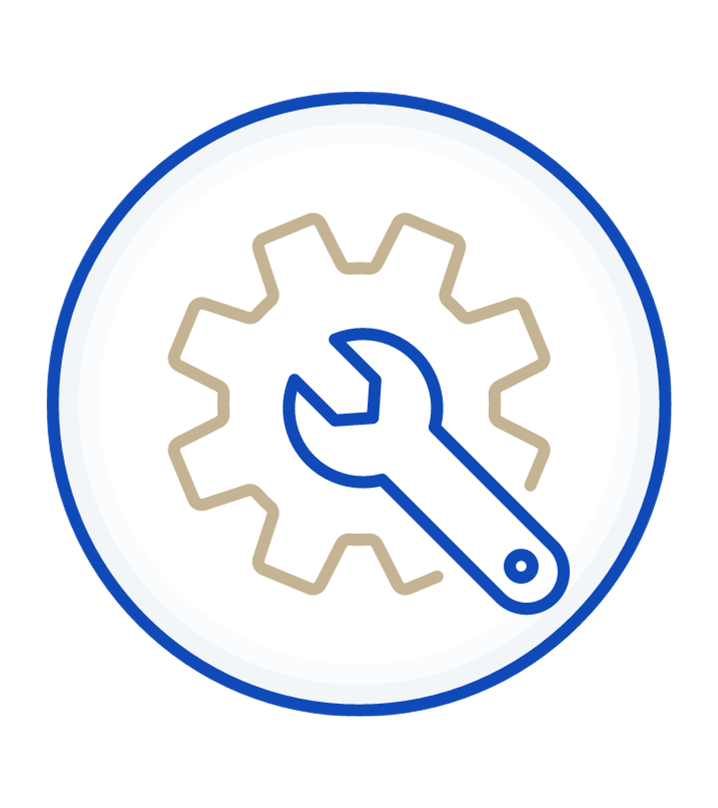 A wrench is sitting inside of a gear in a circle.