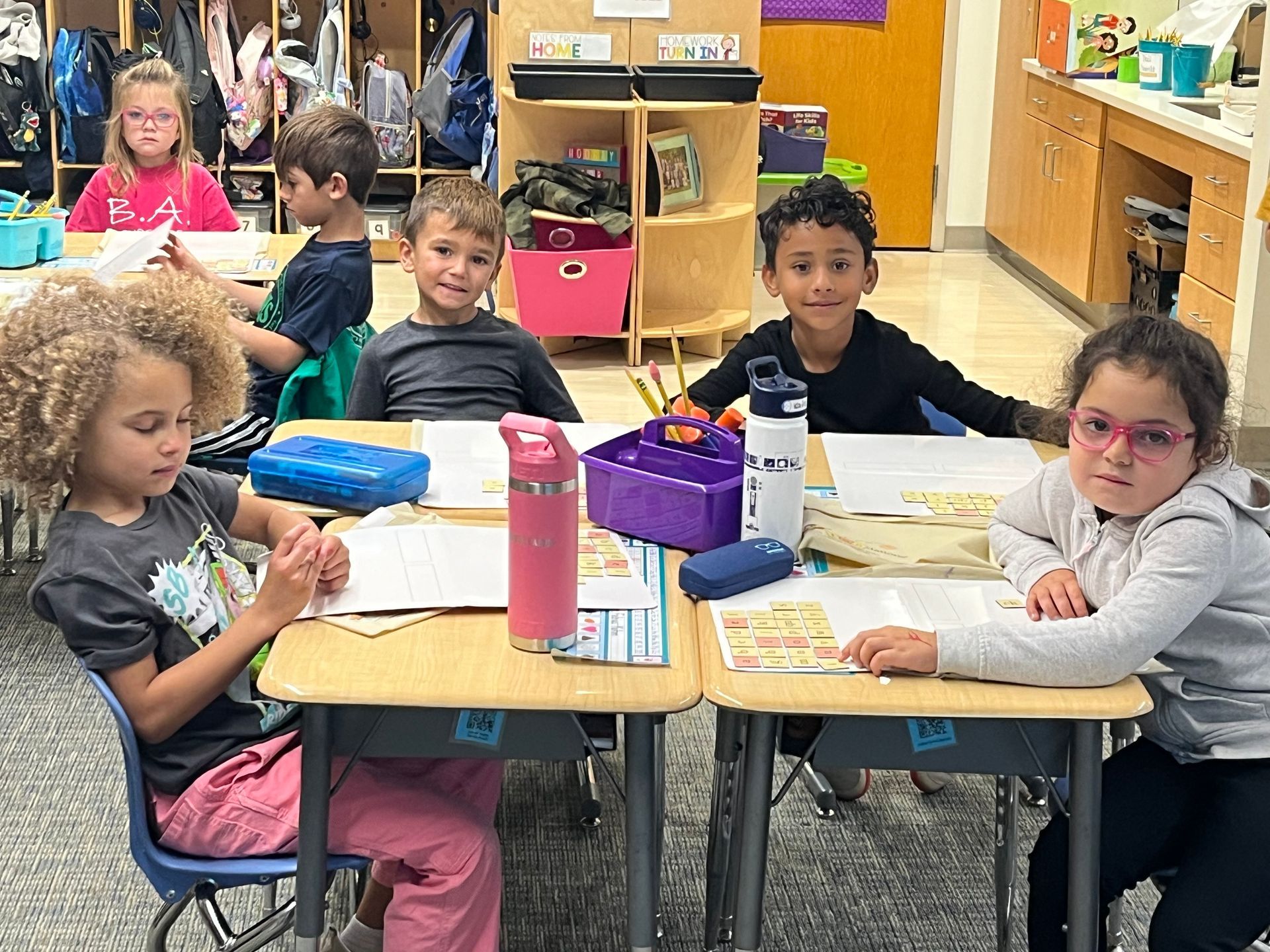 Kids sitting at a desk