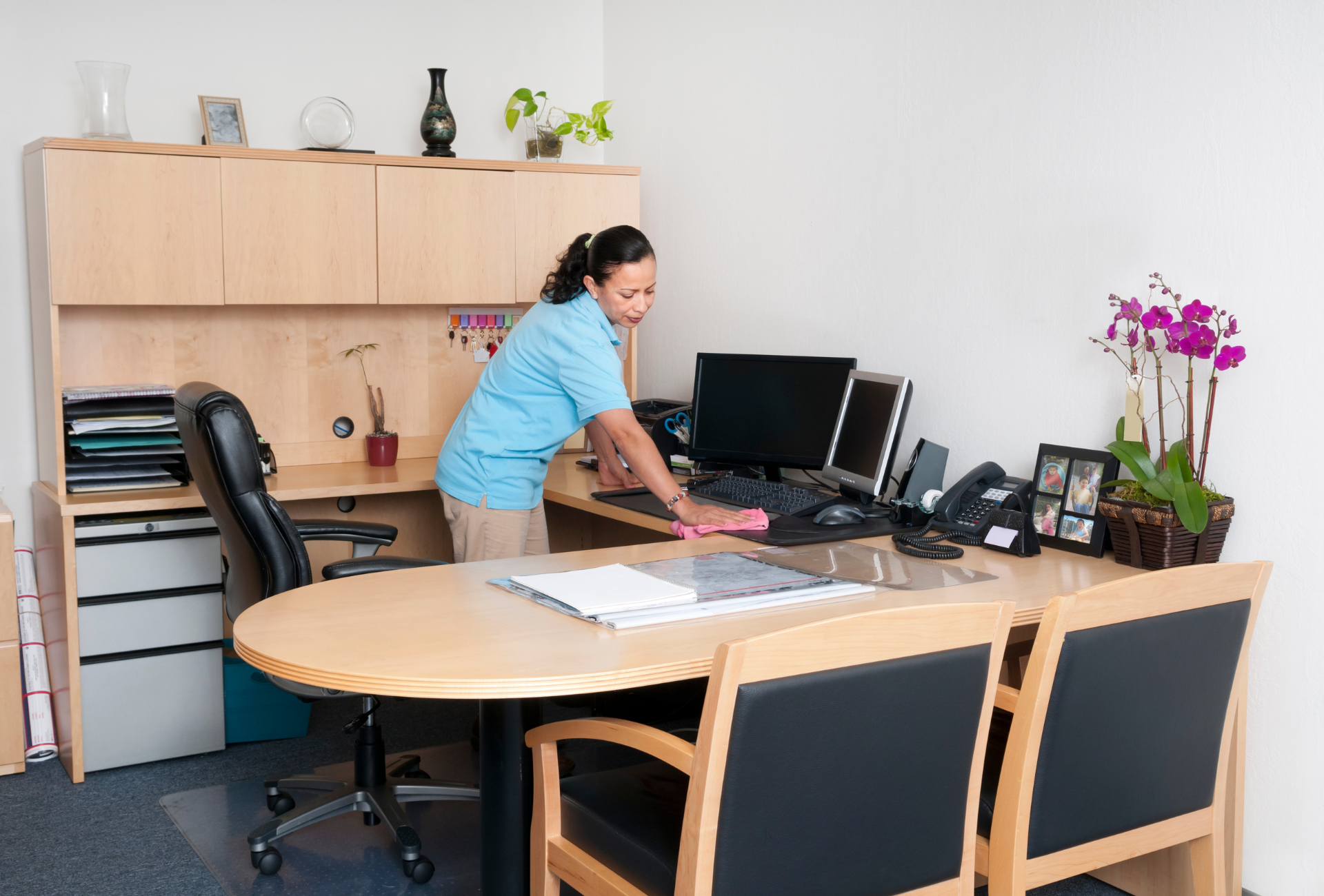 Janitor cleaning a office floor in Cambridge ma.