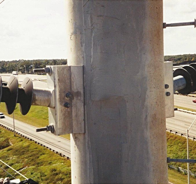 Completed application of Concrete Pole Repair (CPR) to strengthen and repair a damaged utility structure