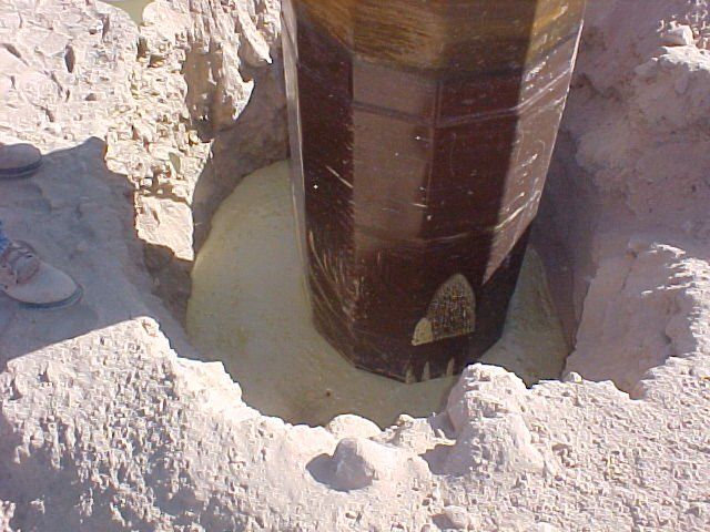 Secure Set foam expanding in a hole to set a power pole for a utility company