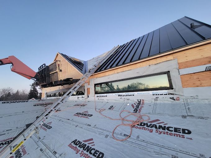 A house is being built with advanced roofing systems.