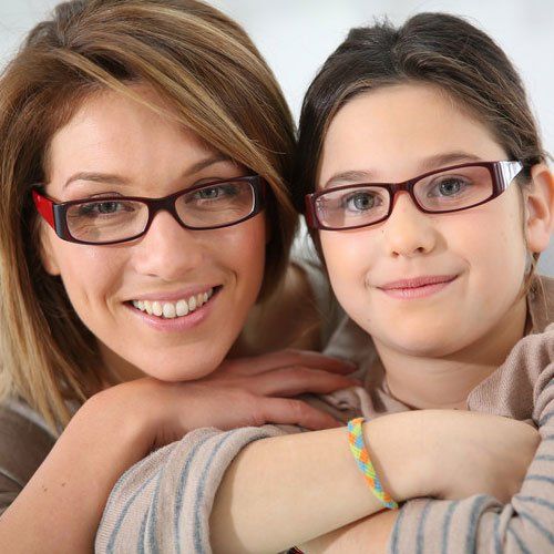 Mother and child wearing frames