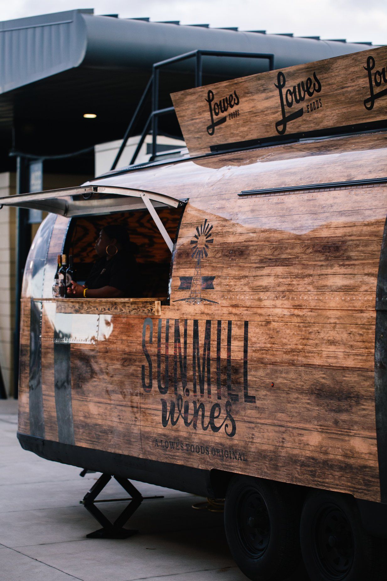 Renovated airstream made to look like whiskey barrel and to be used as a brand activation