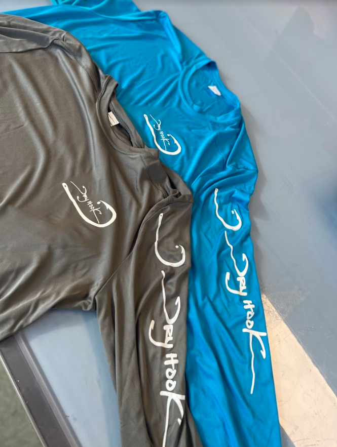 Screen print long sleeve sweat wicking shirts. Screen print is down sleeve