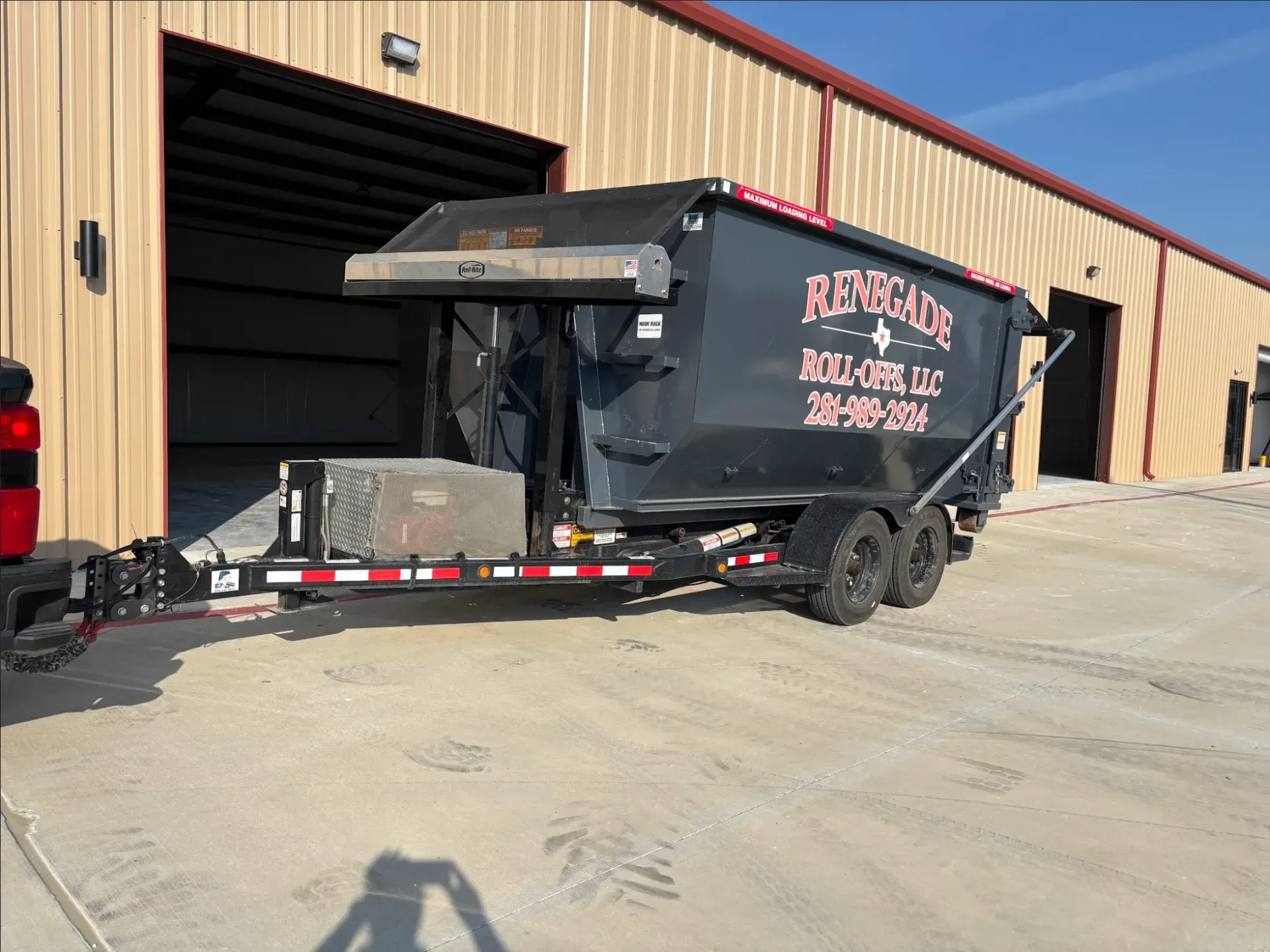 Black dumpster with 