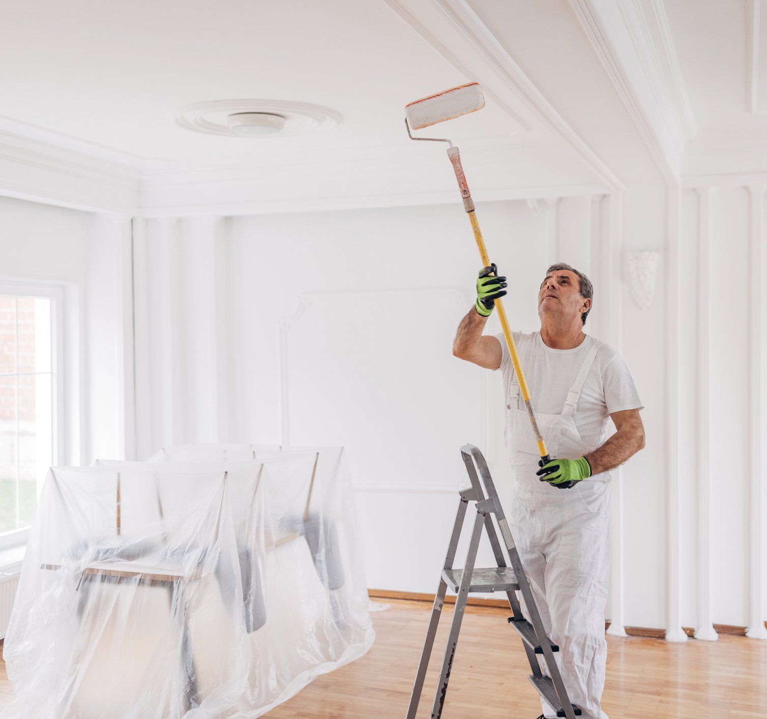 Man Painting Ceiling — Kiama Heights, NSW — Tony Runge Painting Service