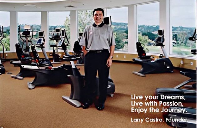 A man stands in a gym with a quote from larry castro