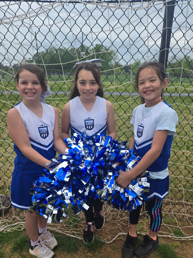 Three young cheerleaders for Northern Piedmont Sports Club