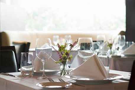 White Table With Arrangement — Restaurant Linen in Detroit, MI