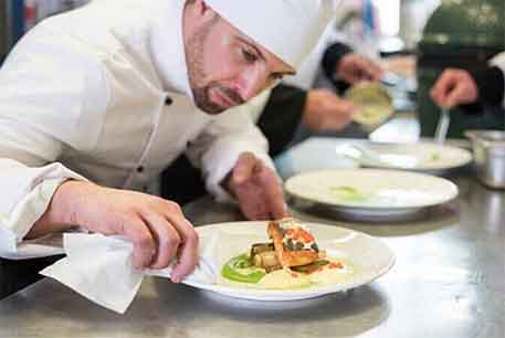 Chef Preparing Food — Restaurant Linen in Detroit, MI