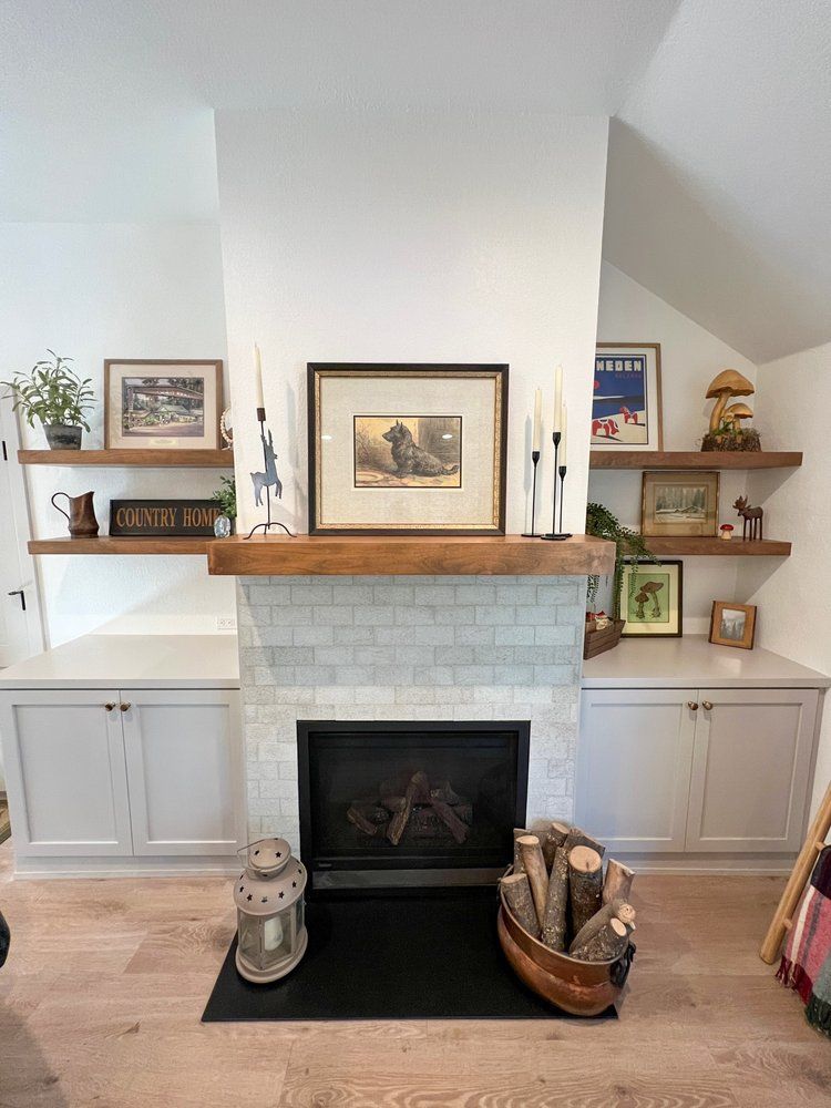 there is a fireplace in the middle of the room .