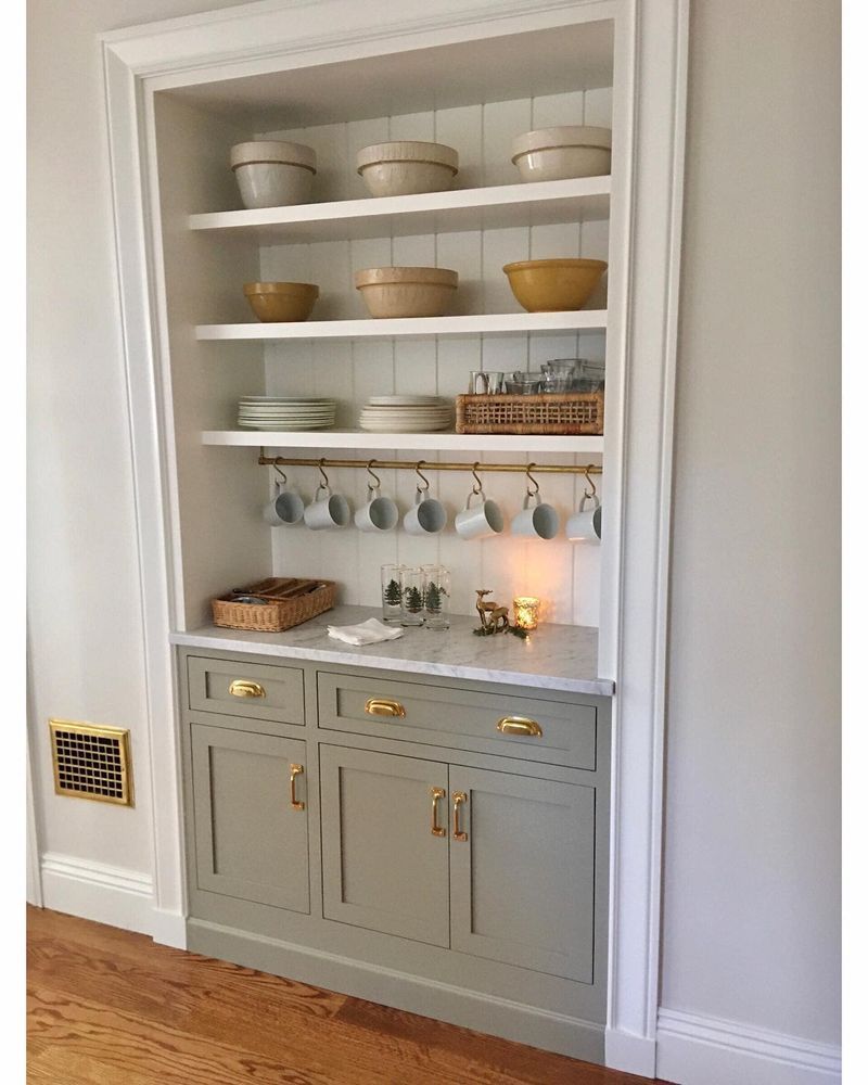 a wooden dresser with drawers and doors in a room