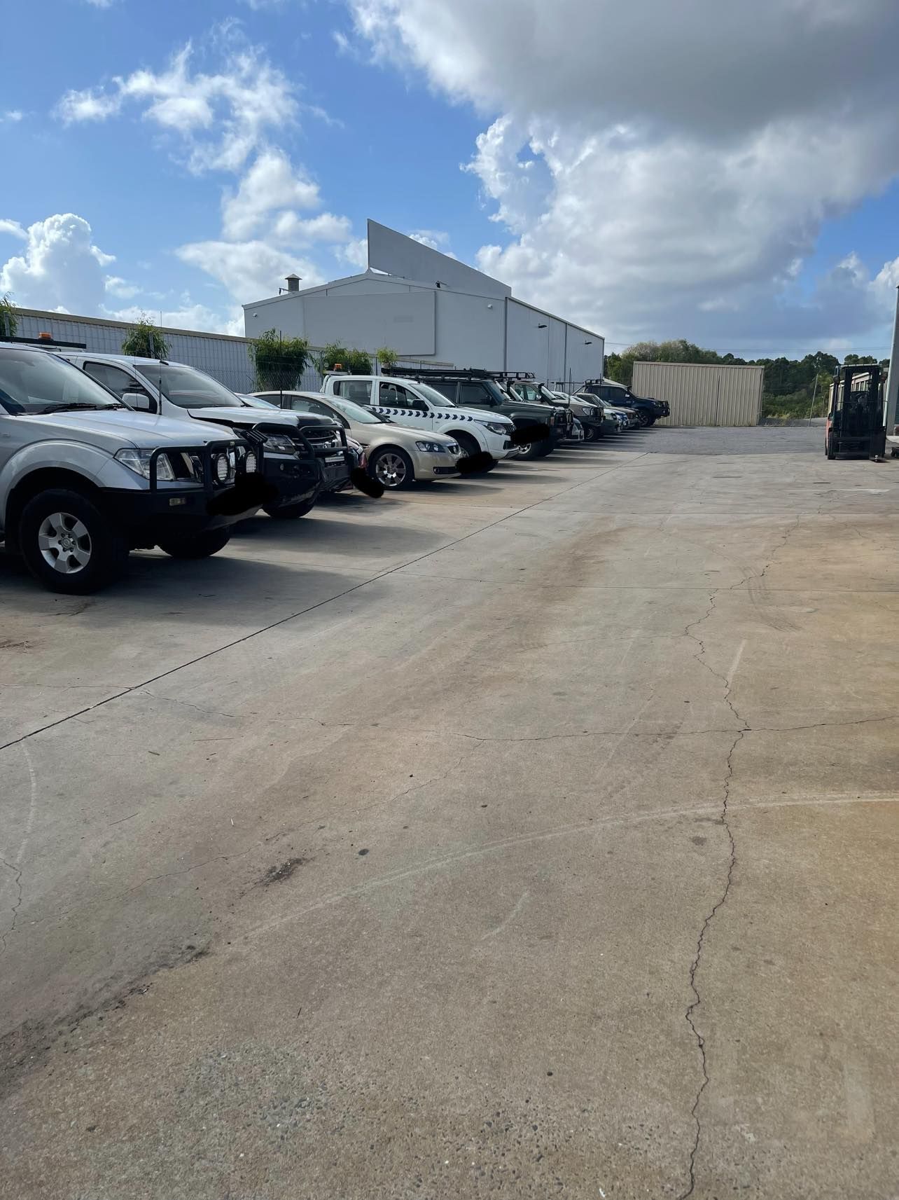 Row of Semi-trucks in Various Colors With Open Hoods — Gladstone Fleet Maintenance In Gladstone, QLD