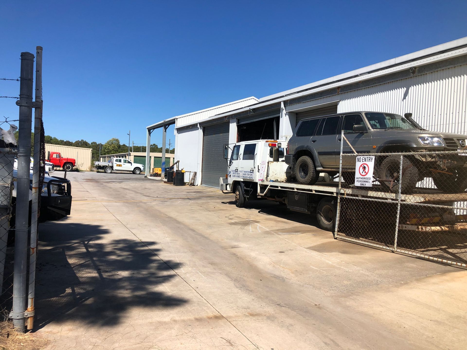 Underside of a Rusty 4x4 Vehicle on a Lift in a Workshop — Gladstone Fleet Maintenance In Gladstone, QLD