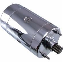 A close up of a chrome starter motor on a white background.