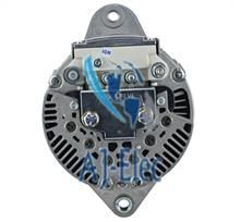 A close up of a alternator on a white background.