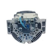 A close up of a alternator on a white background.