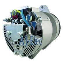 A close up of an alternator on a white background.