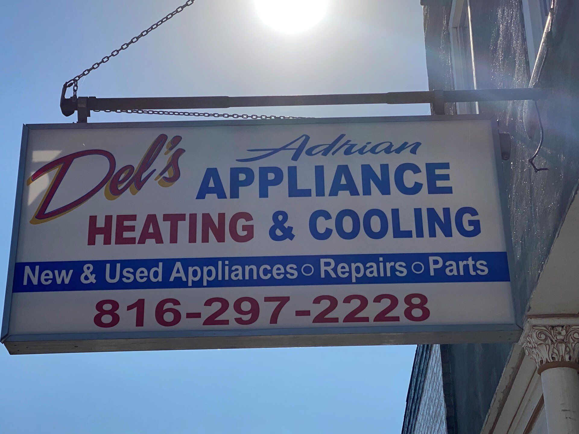 A sign for del 's appliance heating and cooling