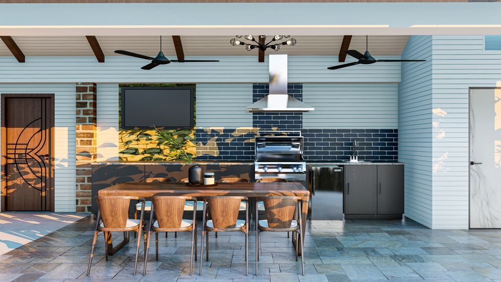 An outdoor kitchen with a wooden table and chairs — PKJ Design in Unanderra, NSW