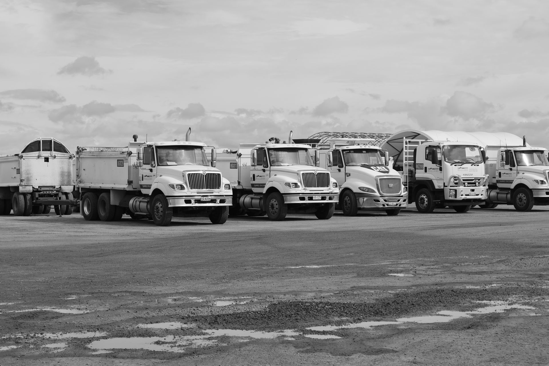 A Yellow Bulldozer Is Moving Dirt on A Construction Site — Hillery Group in Bowen, QLD