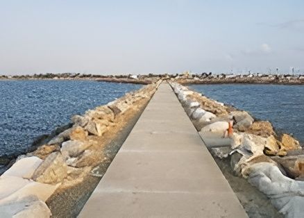 A Long Concrete Pier Leading Into the Ocean — Hillery Group in Bowen, QLD