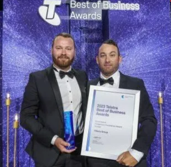 Two men receiving award — Hillery Group in Bowen, QLD