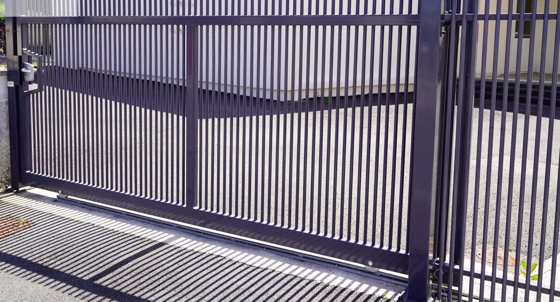A close up of a sliding Automatic Gate installed by Macon Fencing Solutions in Macon, GA