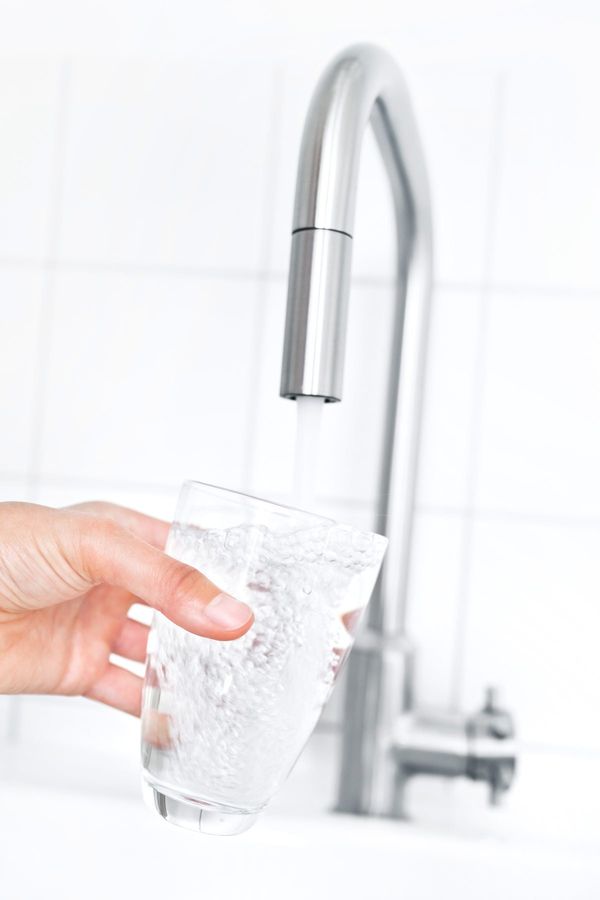 Filling glass of water — St. Petersburg, FL —  IB at UR Service Utility