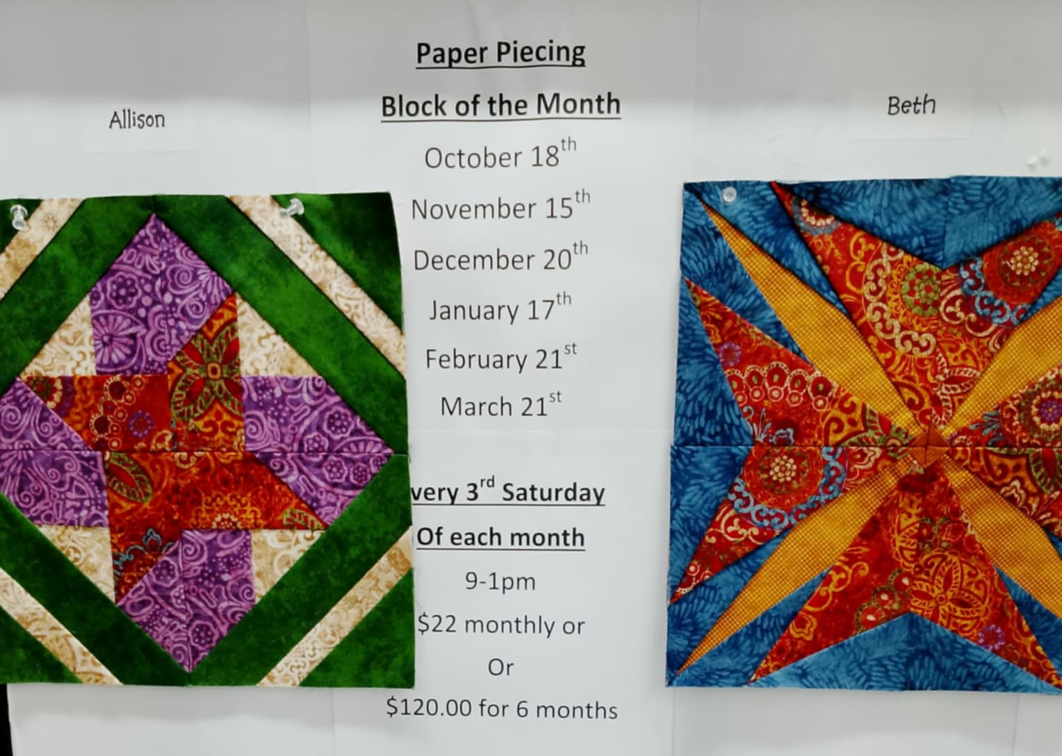 Quilted orange pumpkin with a carved face on blue background.