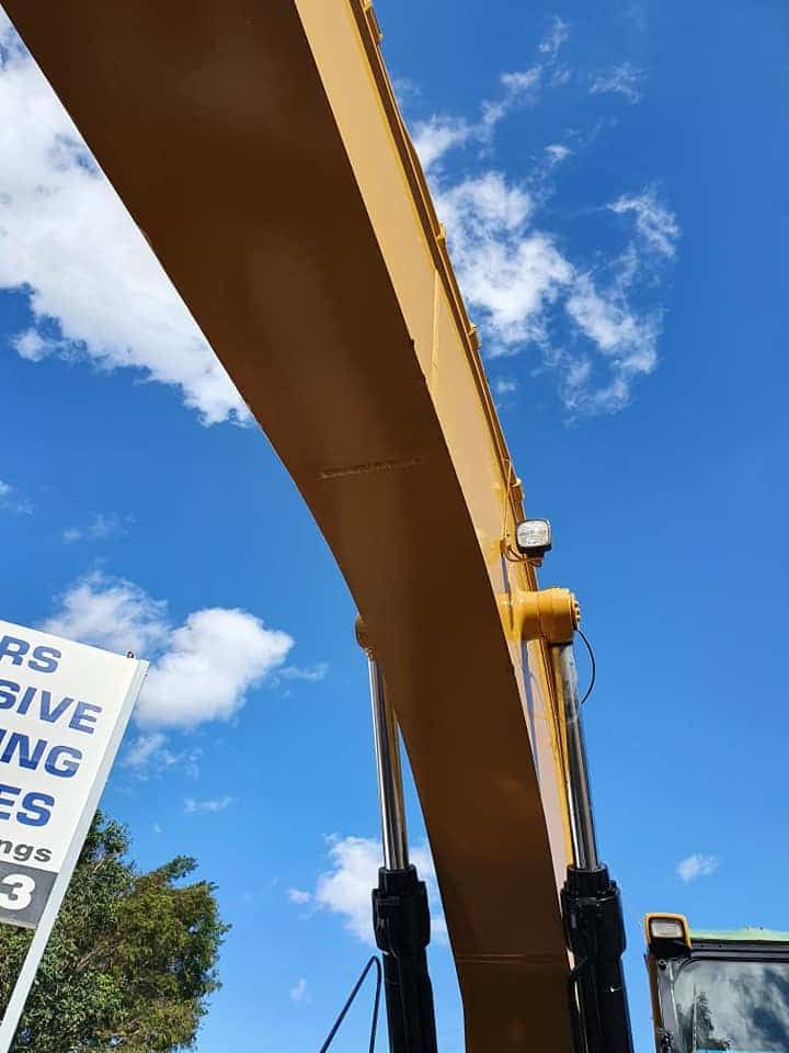 A Yellow Excavator With a Sign That Says Rs Massive Mining — Waters Abrasive Blasting Services In Shaw, QLD